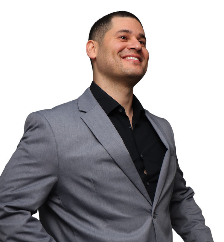 Michael Largo Jr., in a grey suit, smiling